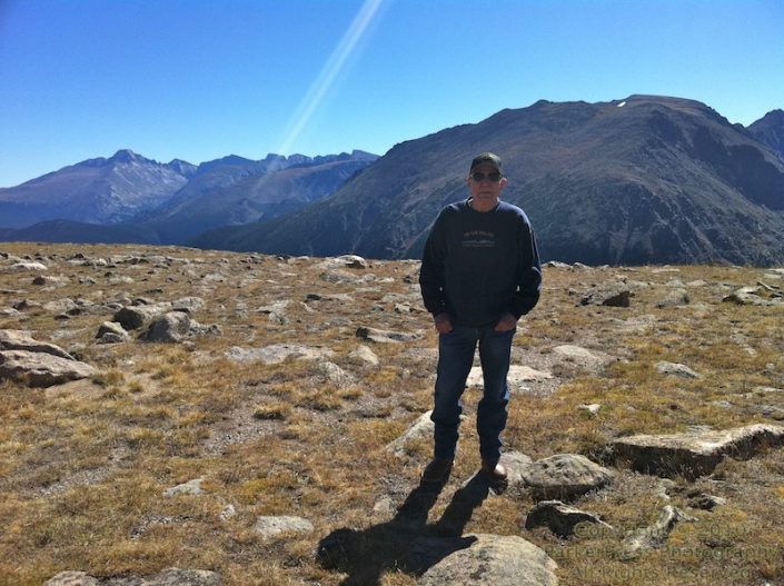At the top of RMNP, with Longs Peak in the background
